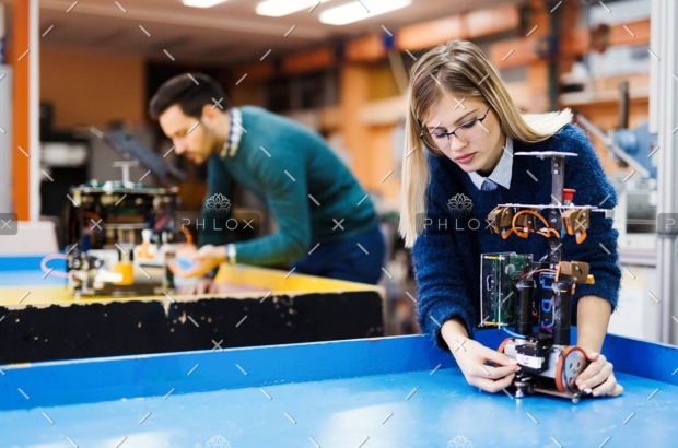 demo-attachment-60-young-student-of-robotics-working-on-project-S32GWUC